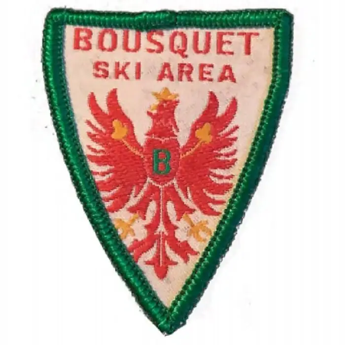 Skiers enjoying the slopes at Bousquet Mountain