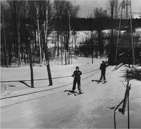Snowboarder catching air at Bousquet Mountain