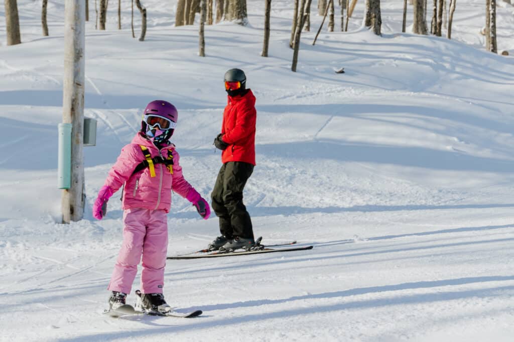 young kid using seasonal ski rentals at bousquet mountain
