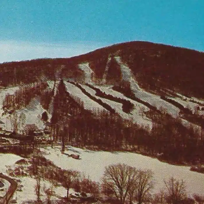 Snowboarders on the slopes at Bousquet Mountain