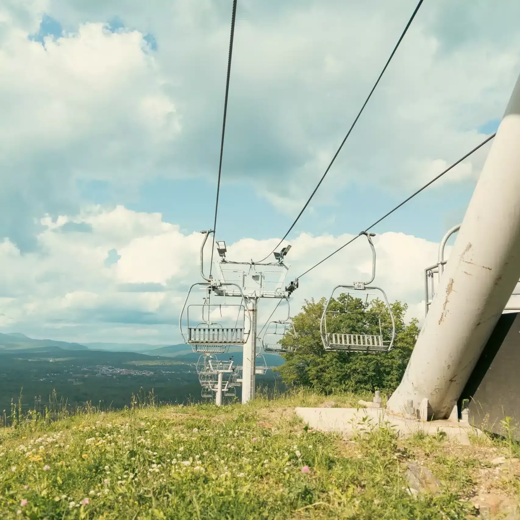Ski lifts on the top of Bousquet Mountain in the summer